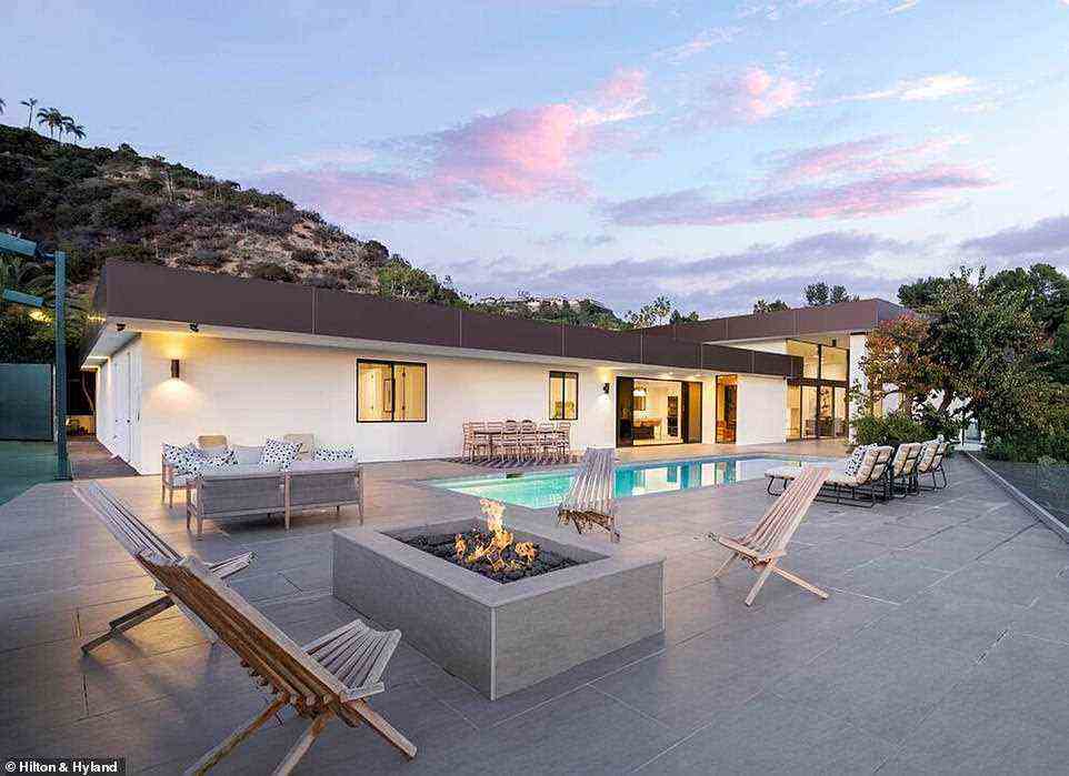 Moving on: David Spade, 57, is selling his longtime Beverly Hills mansion for nearly $20 million, after purchasing it in 2001 for only $4 million, according to the Wall Street Journal