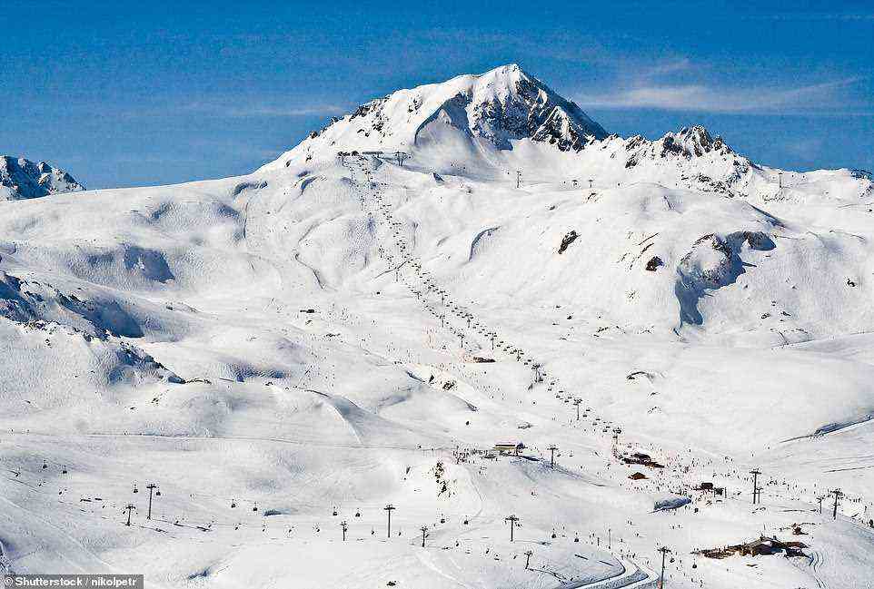 Summit special: Les Arcs in the French Alps is a 'world class' ski resort that forms part of the immense Paradiski ski area. Pictured is a view to the 2,600m (8,530ft) Col de la Chal lift junction in the Arc 1950/2000 area, where the Transarc gondola from Arc 1800 (pictured horizontally along the top) finishes