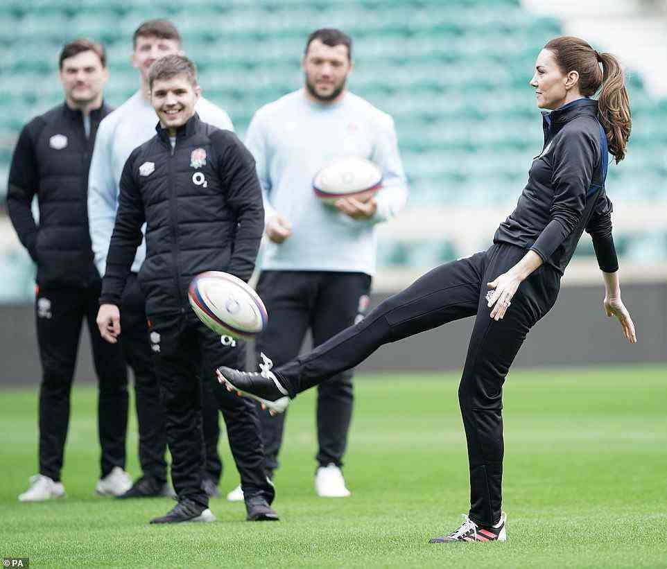 Ready for kick off! Giving her cousin-in-law Mike Tindall a run for his money, Kate showed she's a hands on patron as she kicked the ball today
