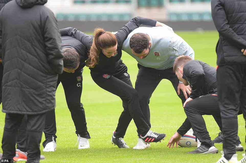 Putting her foot in it! The Duchess of Cambridge showed off her moves as she joined the England players for a session