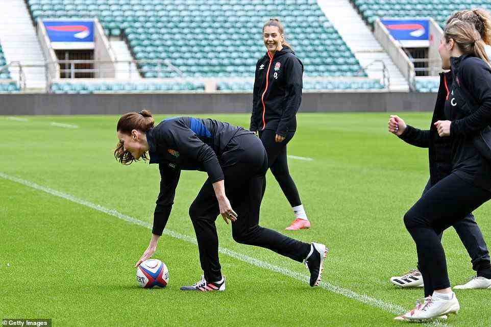 Trying her best! Under the watchful eye of the England Women's Rugby team, Kate scored a try at Twickenham today