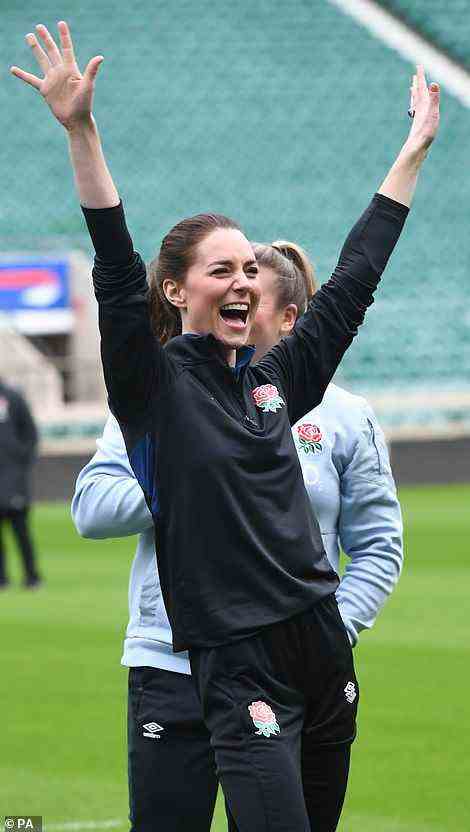 I am the champion! Kate Middleton, who was today announced as the new England Rugby patron, looked thrilled