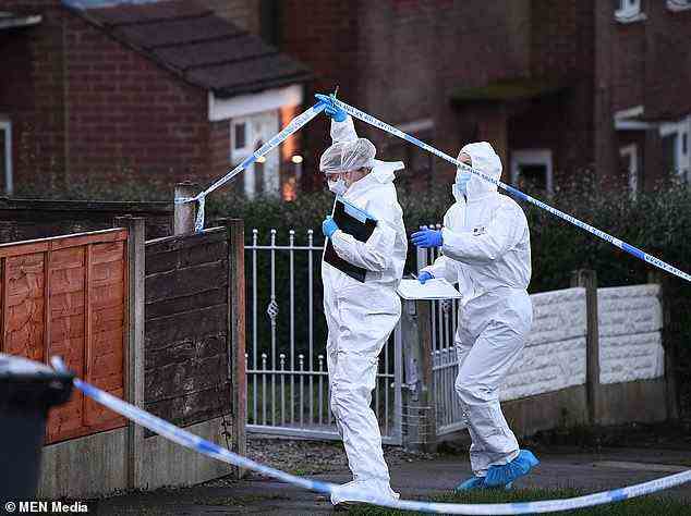 The tributes come as detectives continue to probe the circumstances behind Ms Brown's death. A post mortem has taken place. Pictured: A forensic team at the scene on Friday