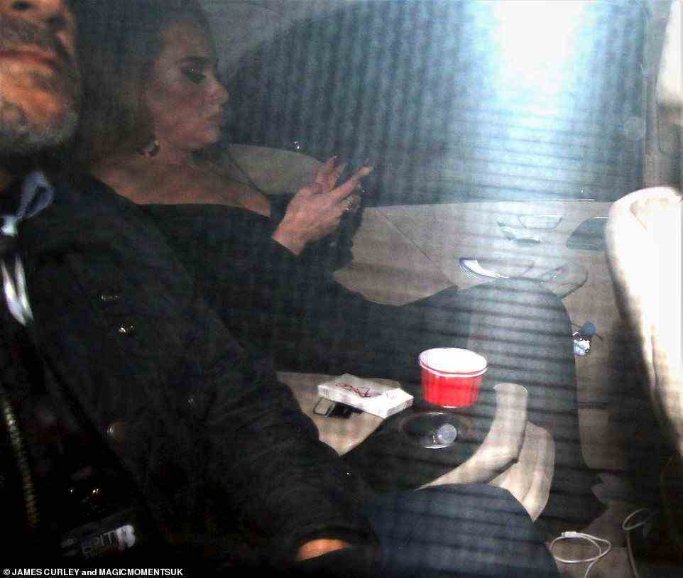 All partied out? Adele was seen leaving the O2 in her slippers as she headed home from the afterparty