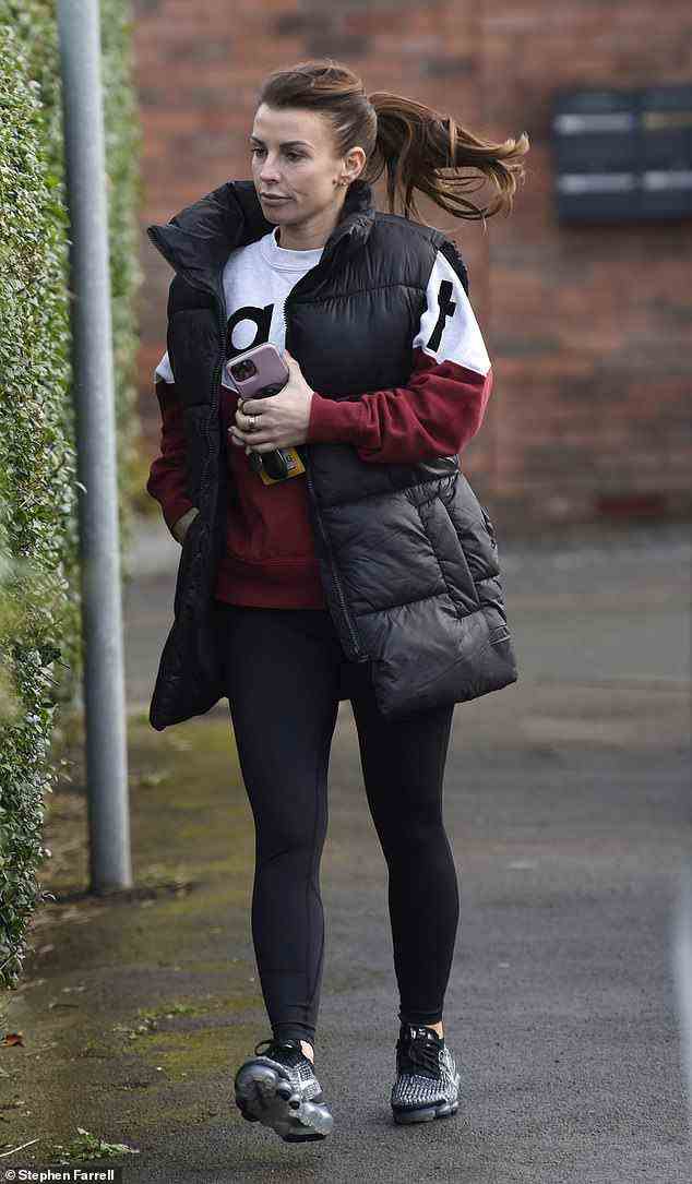 No drama here: The WAG, 35, went make-up free and appeared in remarkably good spirits as she made her way out of the gym after working up a sweat inside