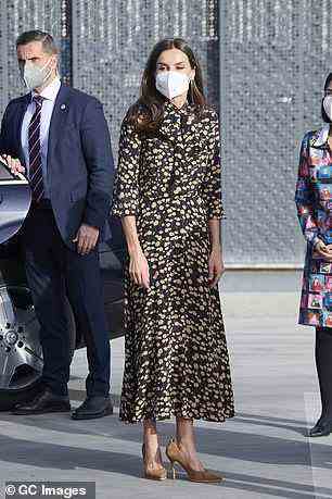 Letizia was the picture of elegance as she left her visit to the university hospital in Madrid this morning
