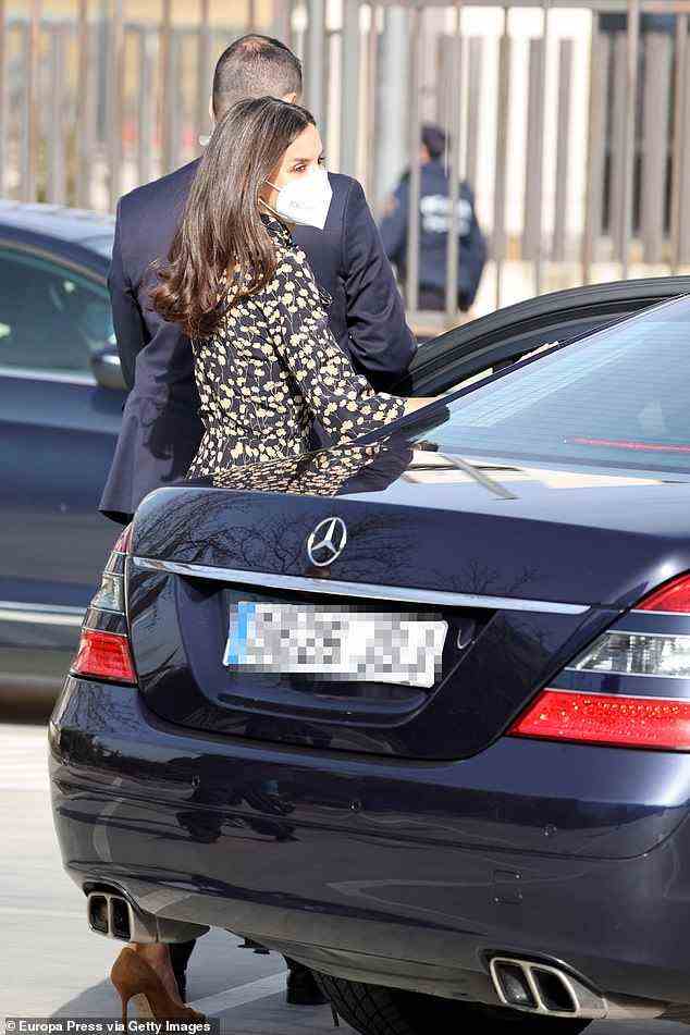 Letizia is pictured leaving after her visit to the Proton Therapy center of the University Hospital Quironsalud in Madrid