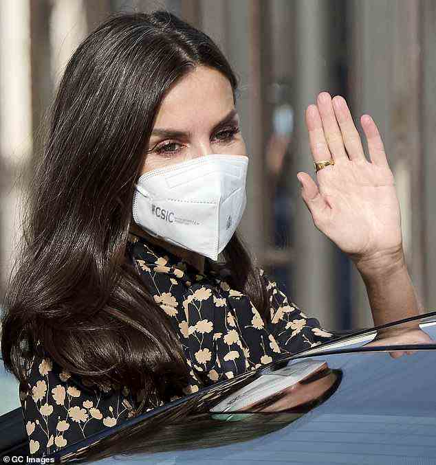 Letizia waved to royal fas as she left the Proton Therapy Center at the Quironsalud Hospital today