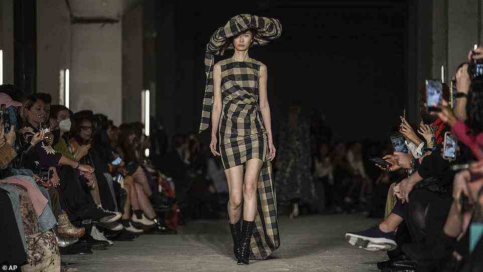 Plaid: There were two plaid looks on the runway. The first was a short black and yellow dress paired with a matching oversized hat and black boots