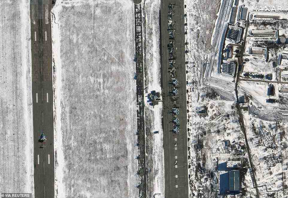 A satellite image shows new helicopter and su25 aircraft deployments, in Millerovo, Russia, seen on Friday. The base is 20 miles away from the Ukrainian border