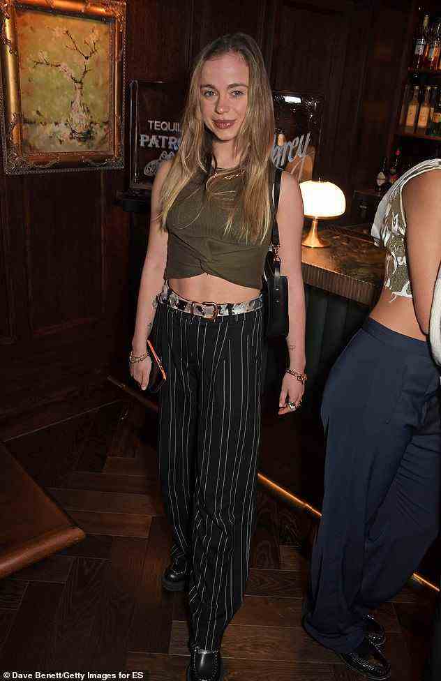 Royalty! Lady Amelia Windsor showed her face too and wore black trousers with a khaki crop top