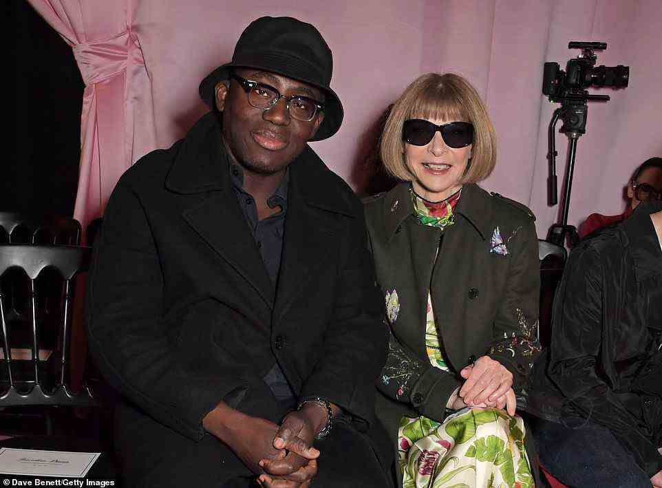 Pals: Anna Wintour was also in good spirits as she sat front row for the show with British Vogue editor Edward Enninful