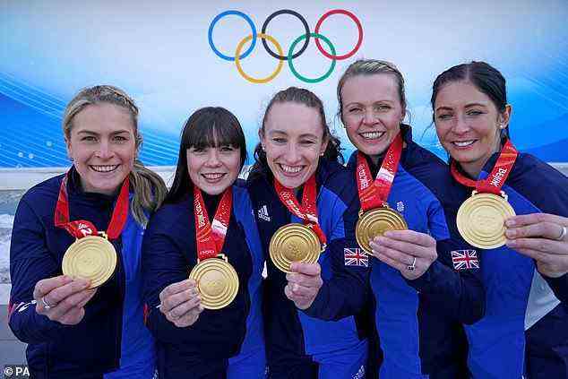 Great Britain's Mili Smith, Hailey Duff, Jennifer Dodds, Vicky Wright and Eve Muirhead celebrate with the gold medal after victory in the Women's Gold Medal at the the Beijing 2022 Winter Olympic Games