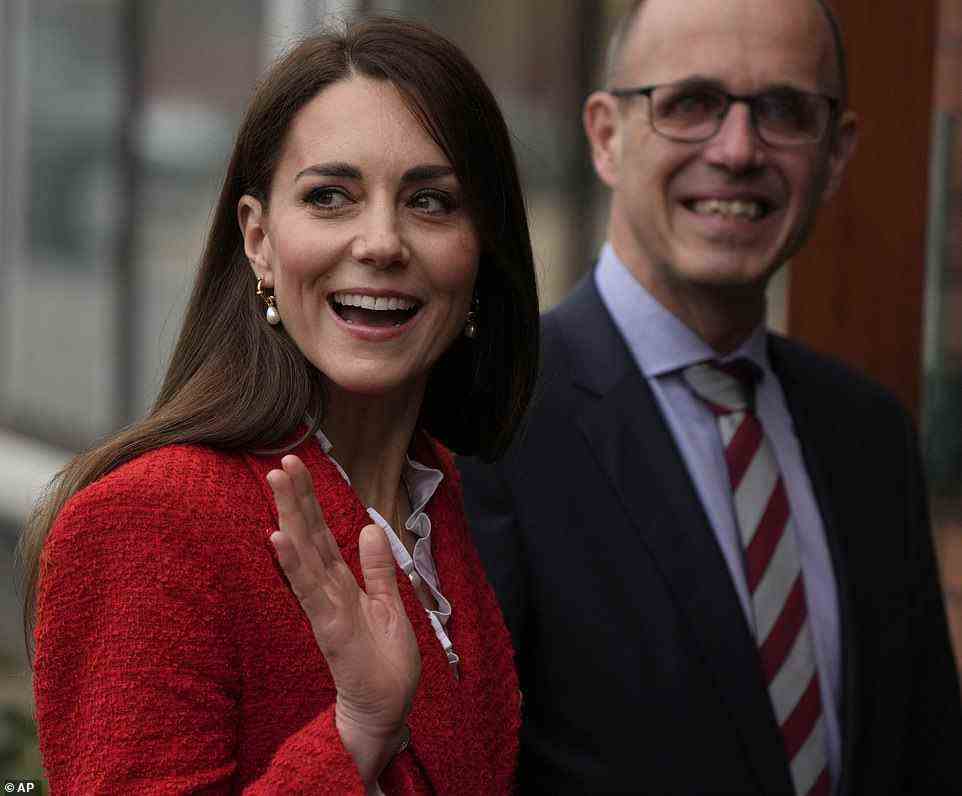 The Duchess of Cambridge waves as she arrives at the University of Copenhagen on Tuesday