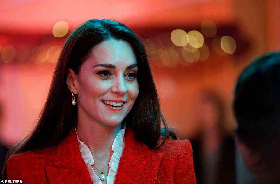 Effortlessly chic: The royal's brunette locks looked sleek around her shoulders and she added a touch of dark eye makeup