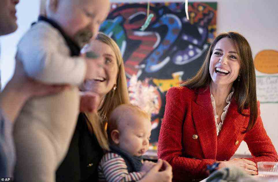 Kate reacts as she speaks to parents about the program, 'Copenhagen Infant Mental Health Project' (CIMPH) 'Understanding Your Baby Project' during a visit to the Children's Museum at Frederiksberg