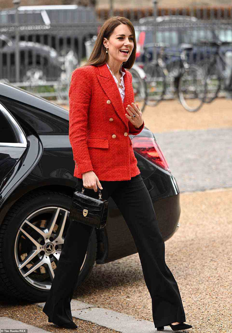 The Duchess of Cambridge put her best foot forward in a pair of black suede heels with chunky heels for the engagement