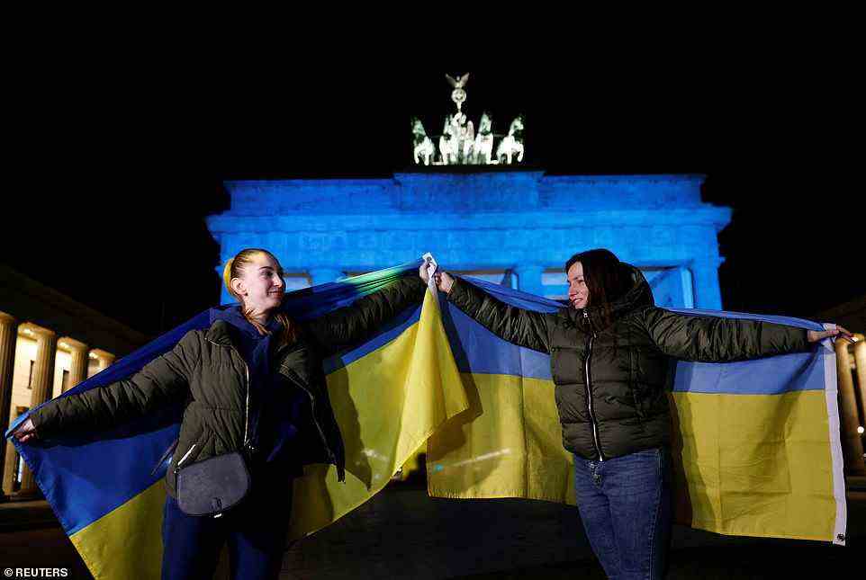 In Berlin, demonstrators waved Ukrainian flags in front of the Brandenburg Gate. The global show of support for Ukraine was taking place as U.S. President Joe Biden warned Ukrainian President Volodymyr Zelensky of an 'imminent' attack by Putin's troops in the next 48 hours