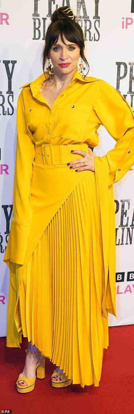 Golden girl: Also putting on a stylish display was Charlene McKenna, who caught the eye in a bold mustard, hanky hem shirt dress teamed with matching platforms
