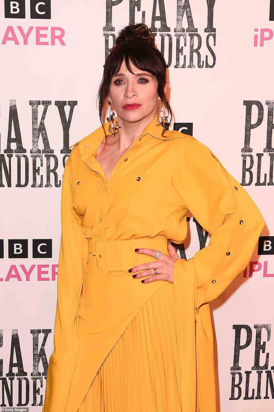 Bright and beautiful: The Irish actress looked amazing in her quirky belted shirt dress