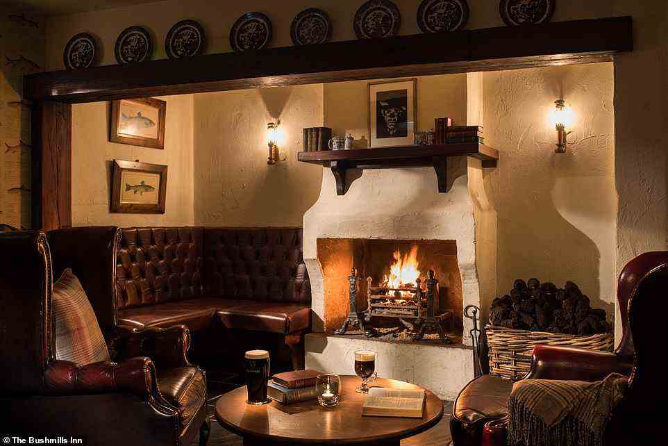 Above is the bar at The Bushmills Inn in Northern Ireland’s County Antrim, which is lit by gaslight and warmed by peat fires