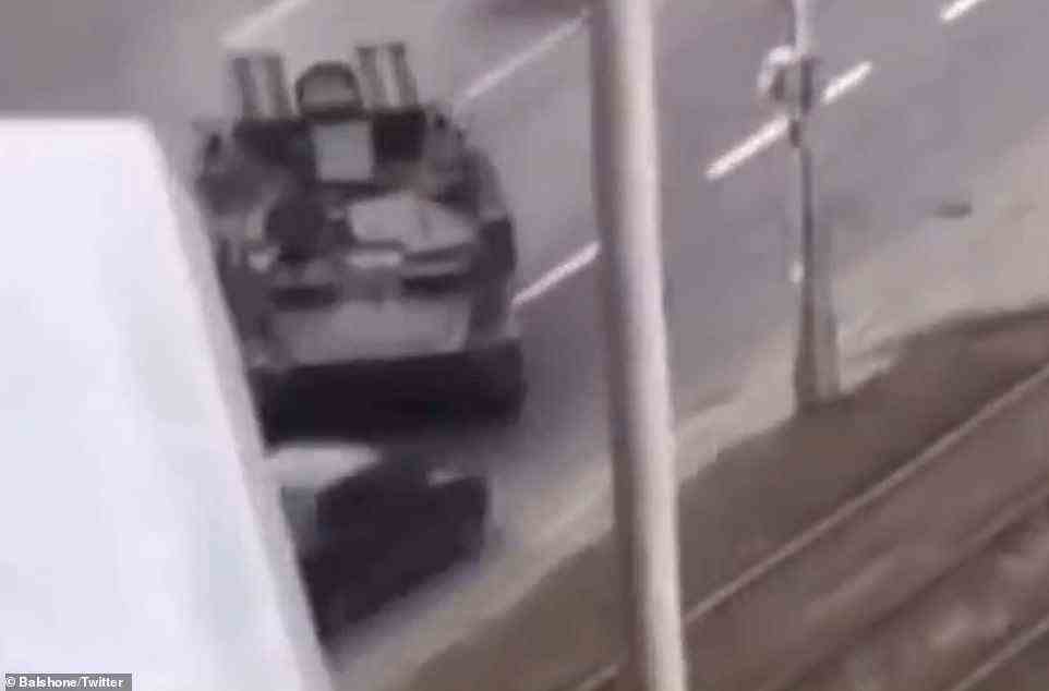 Video shows the shocking moment a Russian tank runs over the car of a civilian