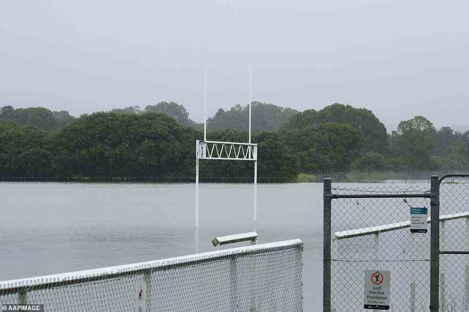 A sports oval in Carrara is now a pool after heavy rain caused flash flooding throughout the Gold Coast