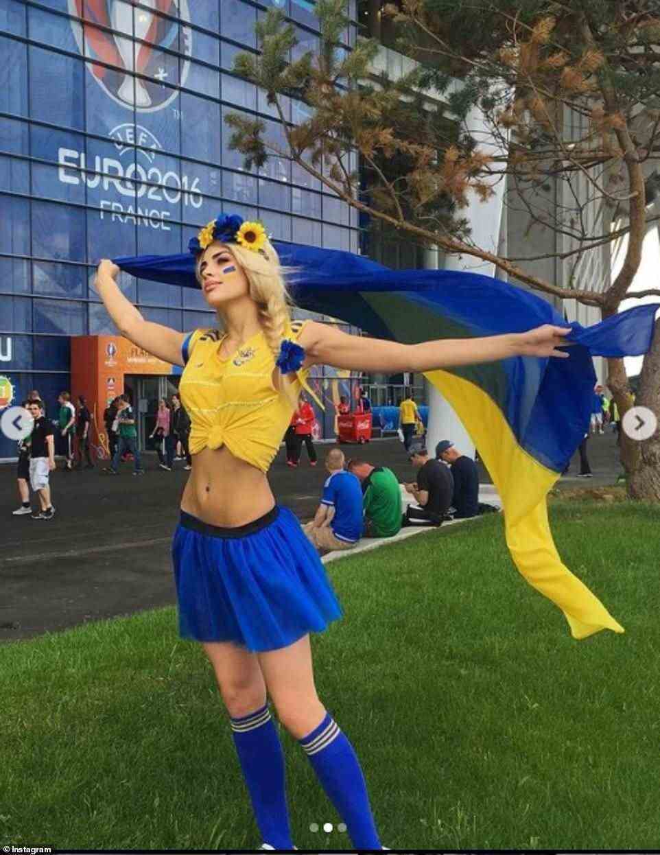 A star in her own right, Vlada has nearly 500,000 followers on Instagram and recently shared a throwback of herself in the stands at Euro 2016, dress in yellow and blue and showing off her washboard abs in a tiny crop top.
