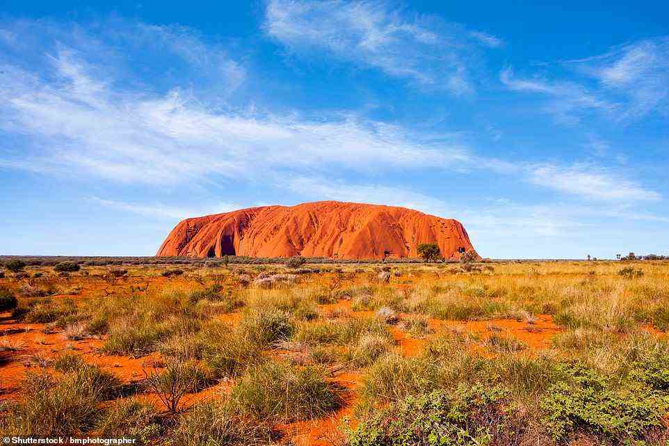 Visit Uluru (pictured), the iconic sandstone monolith rock, on a fortnight-long tour of Australia with Trailfinders