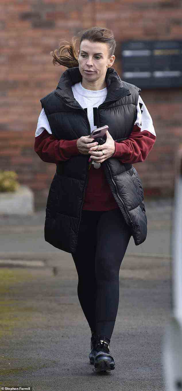 Make-up free Coleen Rooney looked glum as she went for a low-key gym session in Cheshire on Friday... after issuing sassy clapback at troll as husband Wayne's documentary aired