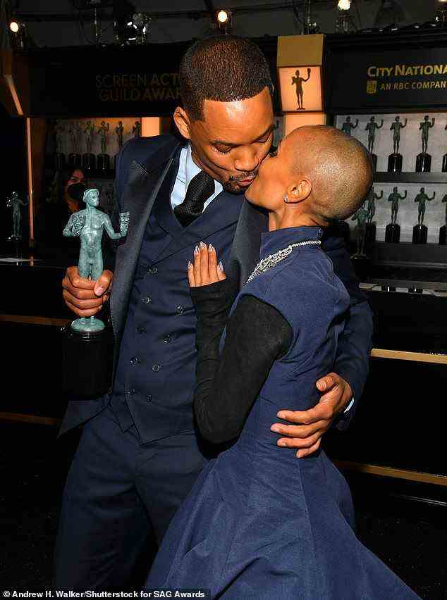 Loved-up: Will Smith shared a sweet kiss with his thrilled wife Jada after scooping Best Actor at the 2022 Screen Actor's Guild Awards on Sunday