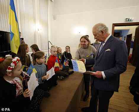 Meanwhile Prince Charles accepted the children¿ cards, including one with the message ¿Stop Putin¿