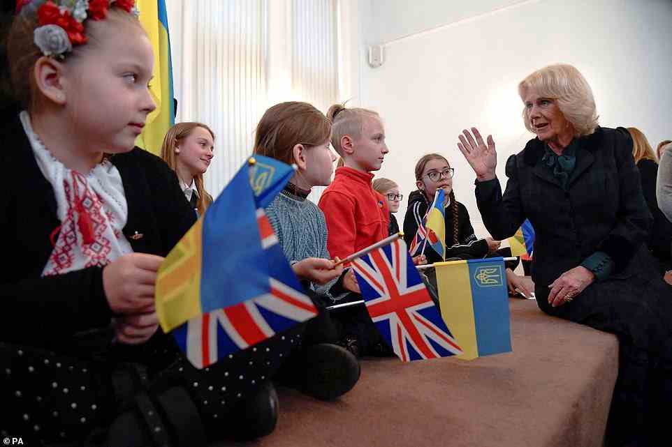 The Duchess of Cornwall, who was emotional throughout the engagement, sat down on stage to speak to children from a British Ukrainian school