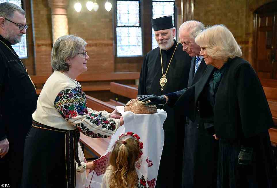 Inside the Cathedral, Their Royal Highnesses met children from the associated Ukrainian school in Holland Park, London and received a traditional offering of bread and salt
