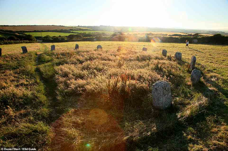 MERRY MAIDENS, LAMORNA, CORNWALL. The tome explains that while these 10 ancient stones are 'well-known and by the roadside', they're 'a wonderful sight nonetheless'. They are said to be maidens turned to stone for dancing on the Sabbath. Coordinates: 50.0651, -5.5887