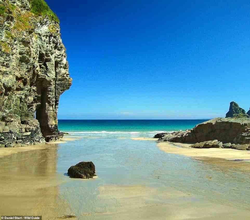 BOSSINEY HAVEN, TINTAGEL, CORNWALL: The book describes this spot as a 'beautiful cove under dramatic cliffs'. When the tide recedes, we're told, 'a long arc of sand is revealed, linking to adjoining Benoath Cove'. Coordinates: 50.6722, -4.7380