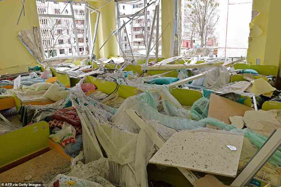 A photograph taken on March 8, 2022 shows the destruction of a nursery following a shelling in Ukraine's second-biggest city of Kharkiv