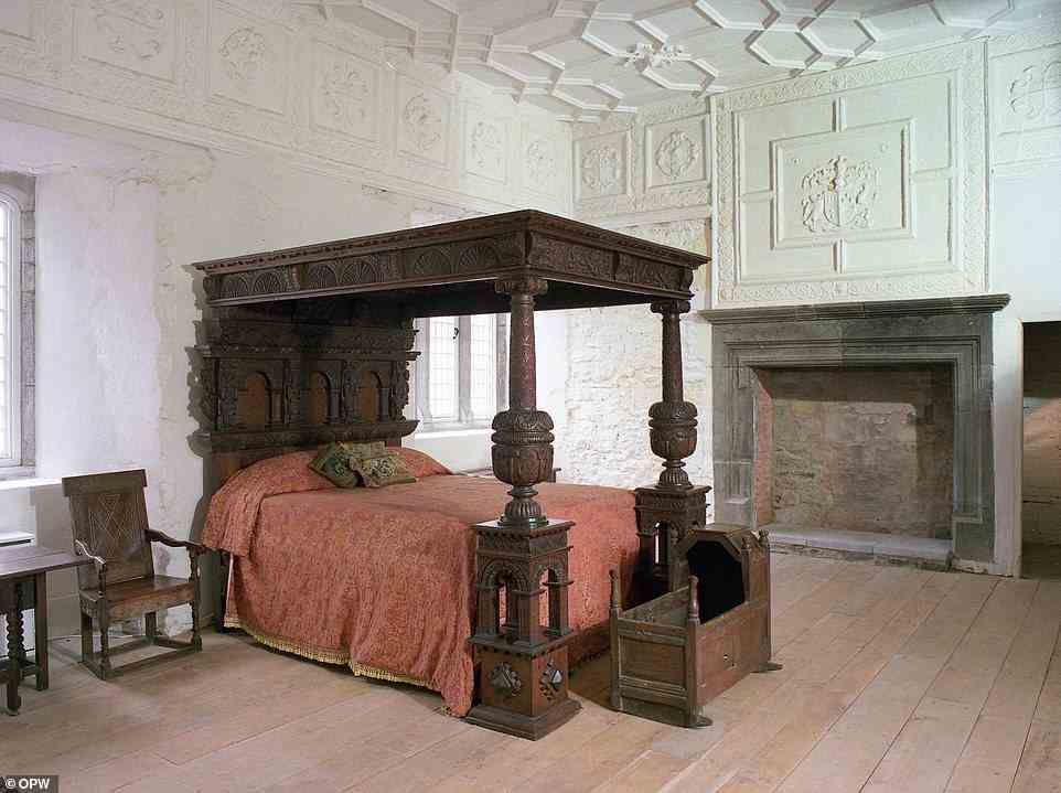 Steeped in history, the rooms have been preserved and decorated with antique furniture. This bedroom has an early 17th-century oak bed and baby's cot