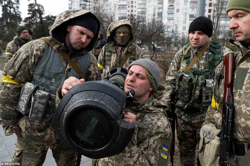 Recent conscripts into the Ukrainian Territorial Defence are trained to use NLAW anti-tank launchers in Kyiv, as the city prepares to defend itself from a Russian assault