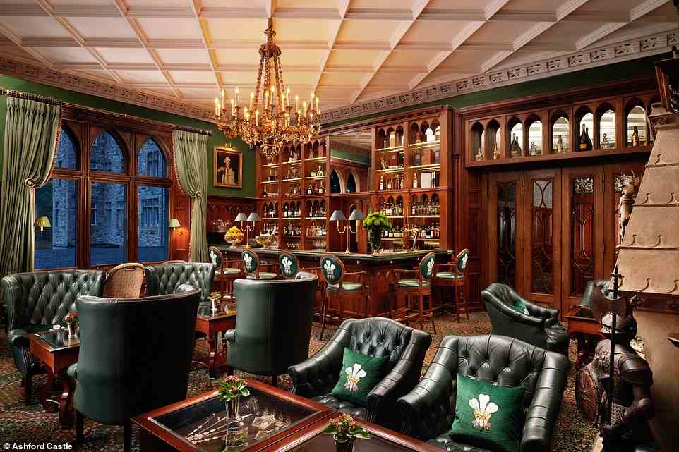 In the evening, a harpist might play as drinkers share stories at the wood-panelled Prince of Wales Bar (pictured) at Ashford Castle