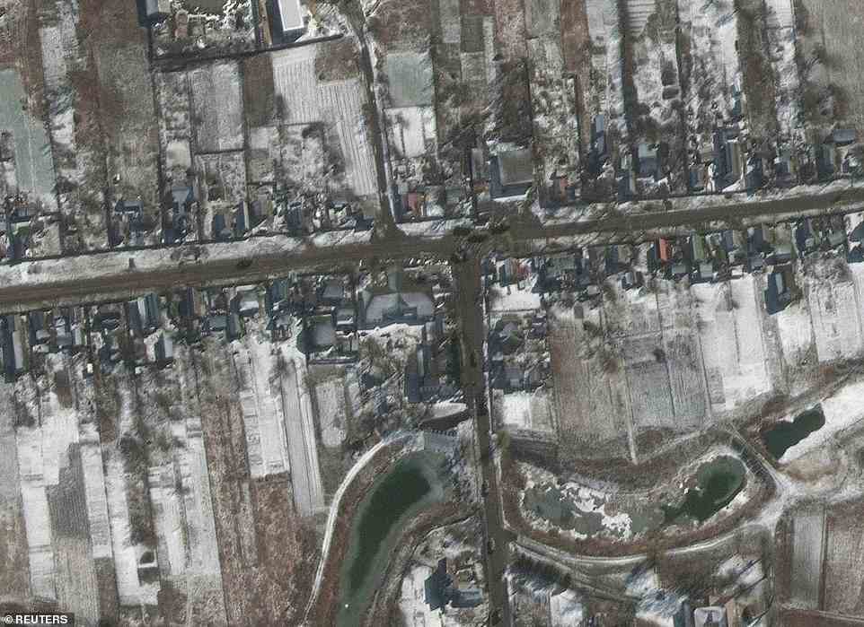 The new satellite images provided by Maxar on Thursday also show armored units maneuvering in and through towns close to Antonov airport northwest of the Ukrainian capital
