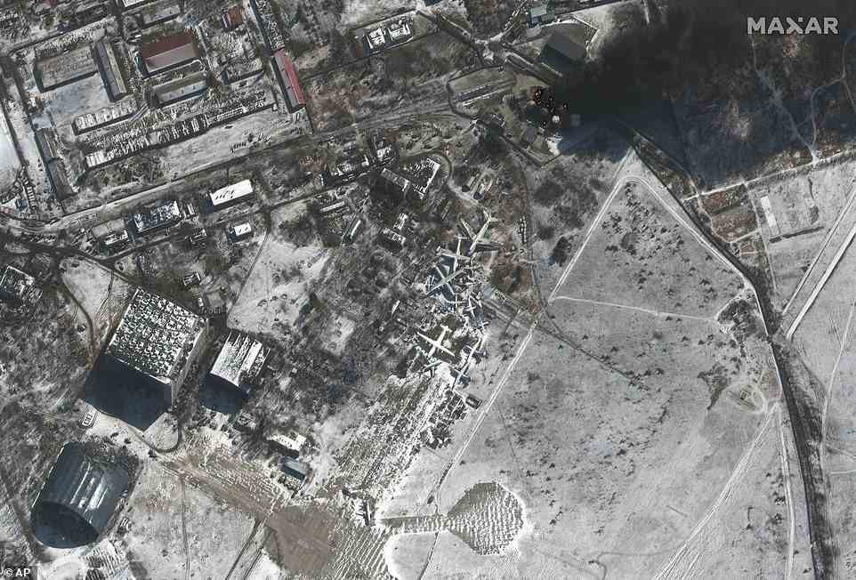 One satellite image shows the southern end of Antonov Airport and fires at the fuel storage area after the Russian invasion, in Hostomel, Ukraine on Thursday
