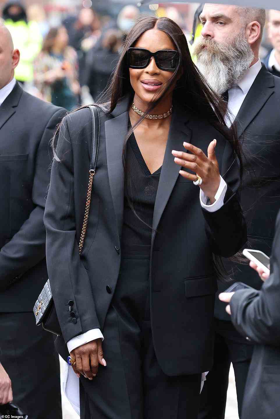 Windy: Naomi showed off her chic style wearing the British brand's design