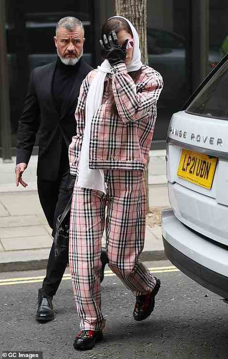 Stylish: Meanwhile Bella caught the eye in baggy pink trousers