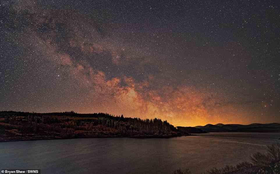 Milky Way over a Scottish landscape. The Milky Way is a disk that measures about 120,000 light years across, with a central bulge that has a diameter of about 12,000 light years