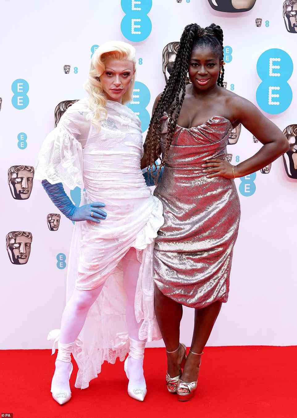 Striking a pose: TV presenter Clara put on a sensational display alongside drag queen Bimini Bon Boulash