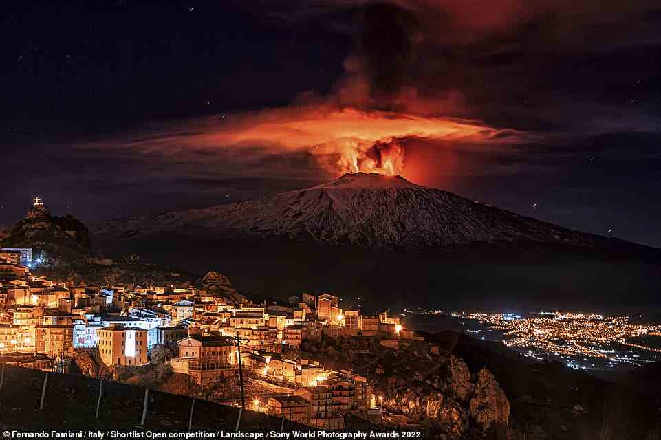 This night eruption of Sicily's Etna volcano was captured from San Teodoro at 2am, and shows three vents ejecting lava up to 1,000 metres (3,280ft) into the air while the twinkling town of Cesaro watches on. Italian photographer Fernando Famiani was shortlisted in the Landscape category for this perfectly-timed photo