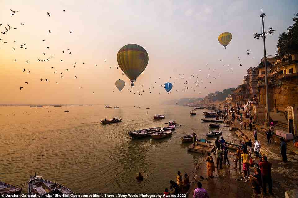 The Varanasi Balloon Festival is a three-day spectacle in Uttar Pradesh, and Indian photographer Darshan Ganapathy has captured the event perfectly. 'The ghats [steps] of Varanasi and the balloons during the sunrise were mesmerising to watch,' the photographer says of their picture, shortlisted in the Travel category. 'The hot air balloons passing through the dim blue sky add vigour to the festival'