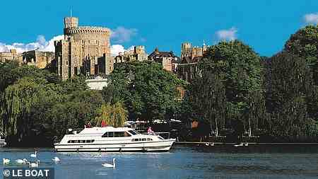 Riverside grandeur: Windsor Castle looms over the Thames