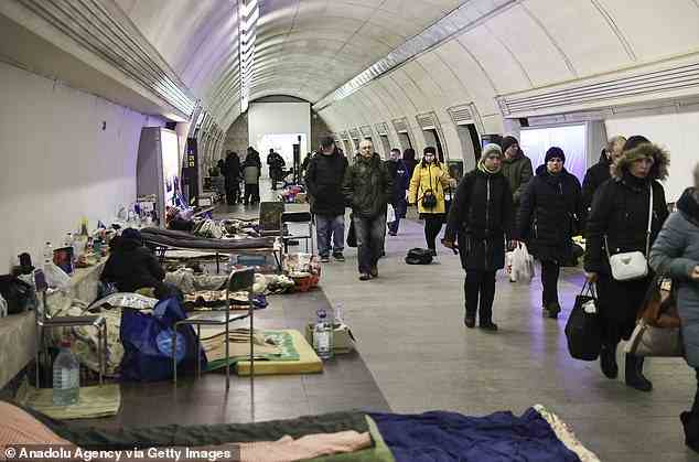 Many civilians have taken refuge in subway tunnels and other underground sites to avoid Russian airstrikes and the combat taking place on the surface. While it is likely to safest place to be at the moment, it is also an area ripe for the spread of infectious diseases like measles and Covid. Pictured: Ukrainian civilians shelter in a Kyiv subway station